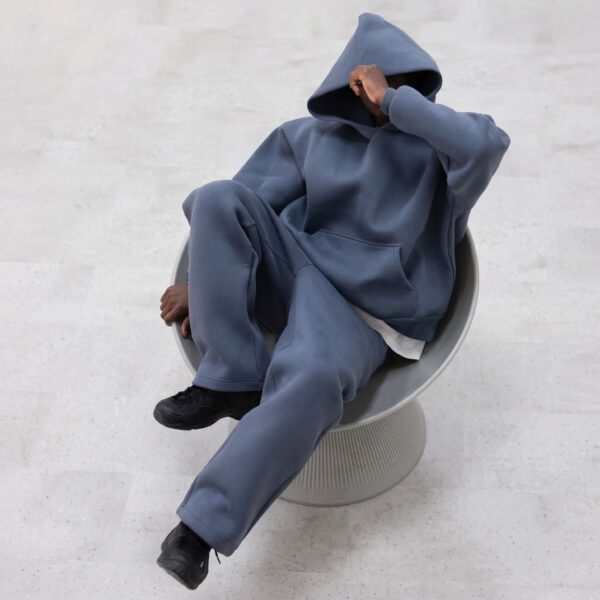 Model wearing custom heavyweight hoodie and sweatpants set