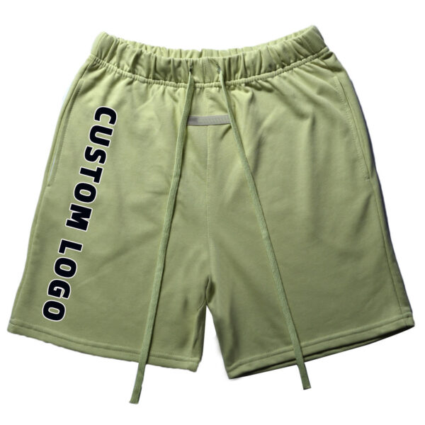 Green sports shorts front view