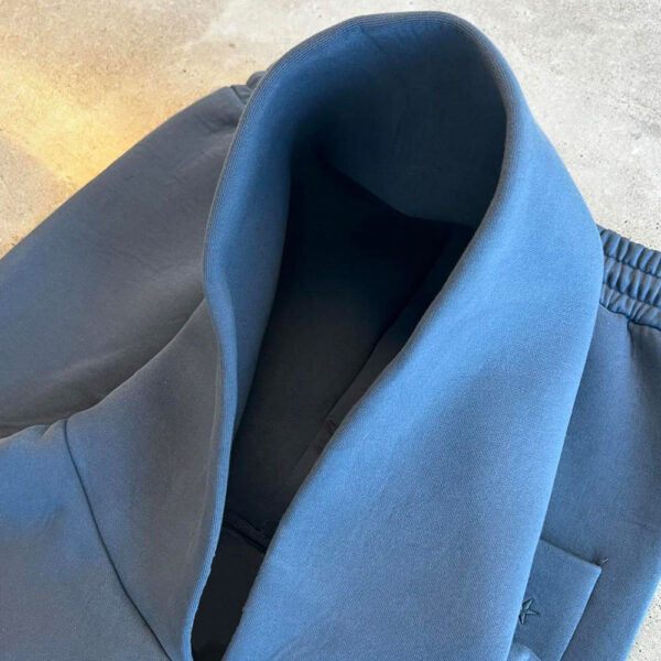 Close-up of hoodie fabric and stitching, showing texture and quality