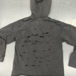 Custom distressed hoodie flat lay back view